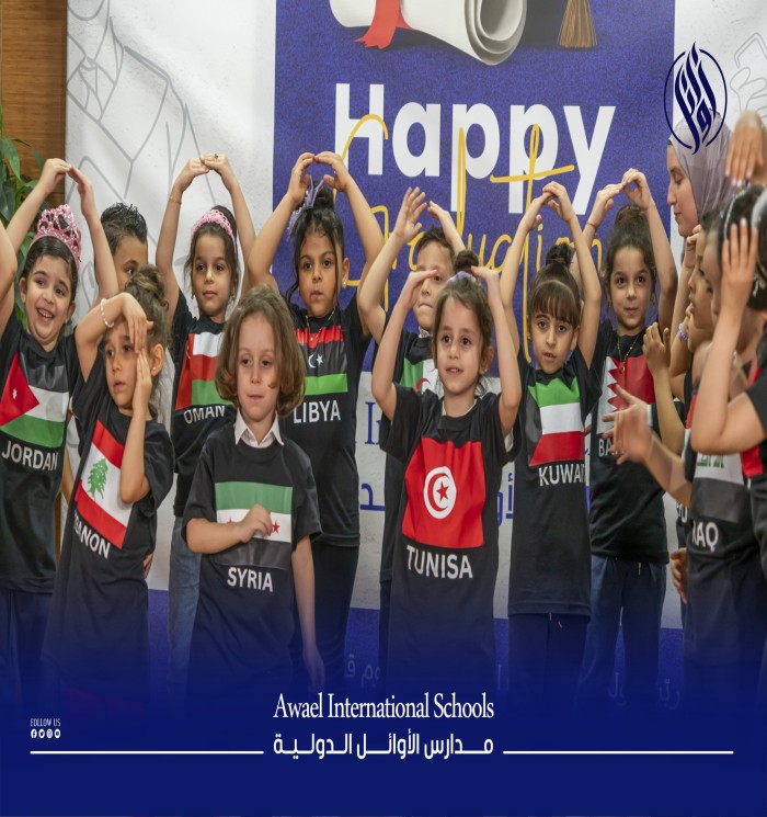 The children of Awael Kindergarten stood on stage like blossoms in full bloom before their parents