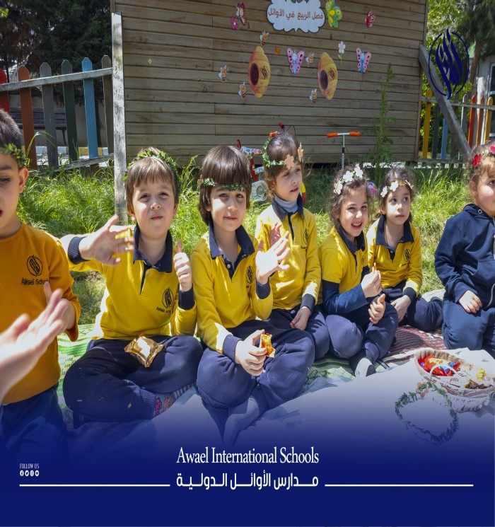 In spring, flowers bloom in the garden of Awael Schools, adding a joyful atmosphere with their vibrant colors
